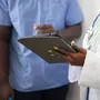 Healthcare professional supporting a patient