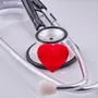 Medical stethoscope on a heart background